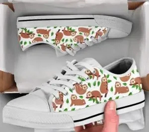 A pair of sneakers with a print of sloths