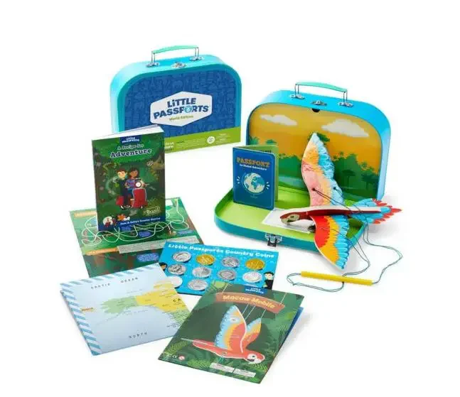 A small toy suitcase for children with books