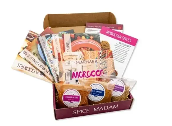A box of Spice Madam with Moroccan spices and recipe cards inside