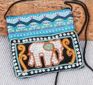 A small bag handmade in Thailand decorated with elephants
