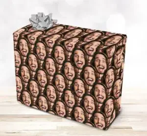 Funny way to wrap gifts with wrapping paper of someone's face
