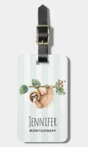 Luggage tag with a print of a sloth and a personalization