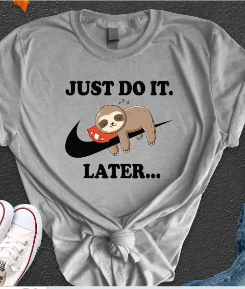 A shirt with the nike logo and the text "just do it later"
