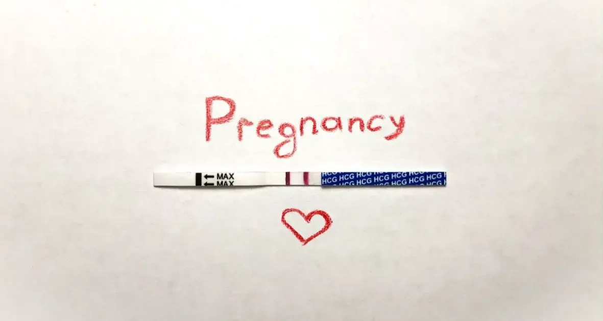 A pregnancy test and a heart