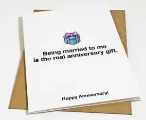 "Being married to me is the real anniversary gift" funny card