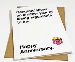 Funny wedding anniversary quote card with "Congratulations on another year of losing arguments to me. Happy Anniversary"