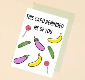 Valentine's Day card message with "this card reminded me of you" with images of bananas, eggplants, and cucumber