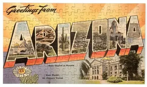 A jigsaw puzzle of a postcard that says "greetings from Arizona"