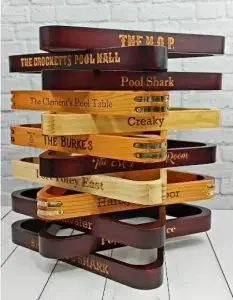A stack of pool triangles with personalized messages