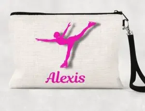 A personalized pouch with a name and an icon of a figure skater