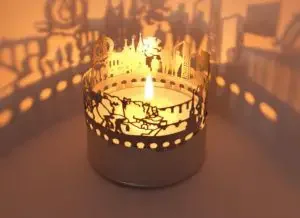 A candle holder with the skyline of Luxembourg city