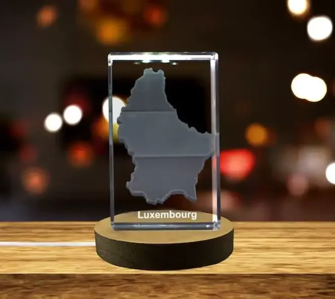 A crystal glass with the map of Luxembourg etched