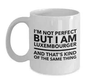 A white mug with the text 'I'm not perfect but I am Luxembourger and that's kind of the same thing"