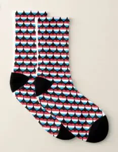 A pair of socks with hearts in the color of the map of Luxembourg