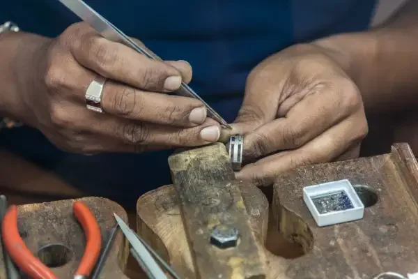 A woman making a ring herself