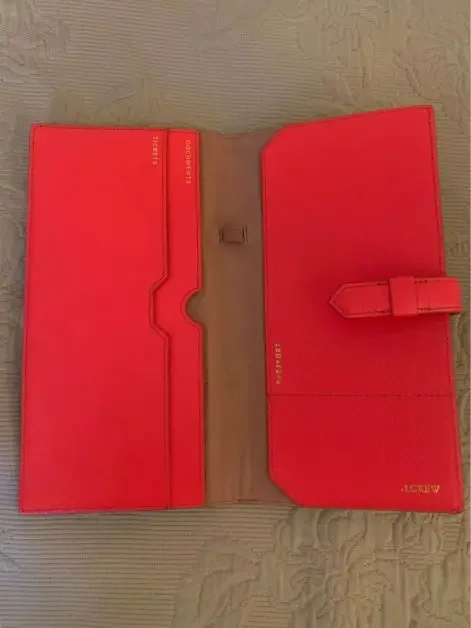 A red passport wallet