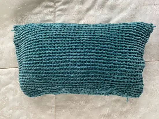 A self-knitted pillowcover
