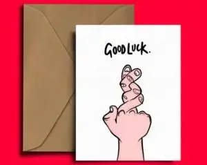 A funny good luck card with fingers crossed many times