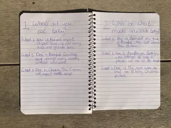 Two pages in a journal with questions answered