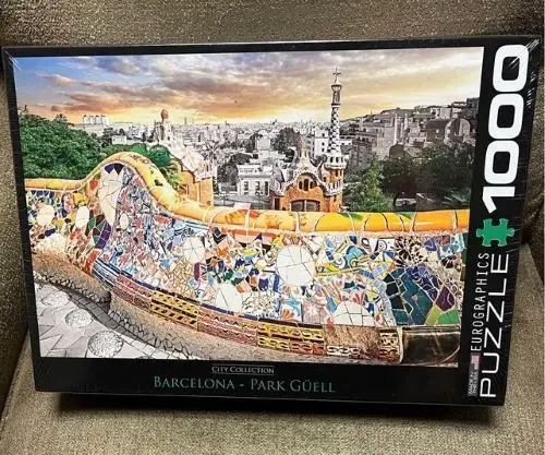 A box of a jigsaw puzzle of Park Guell in Barcelona